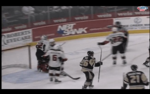 Referee Miller signals goal...